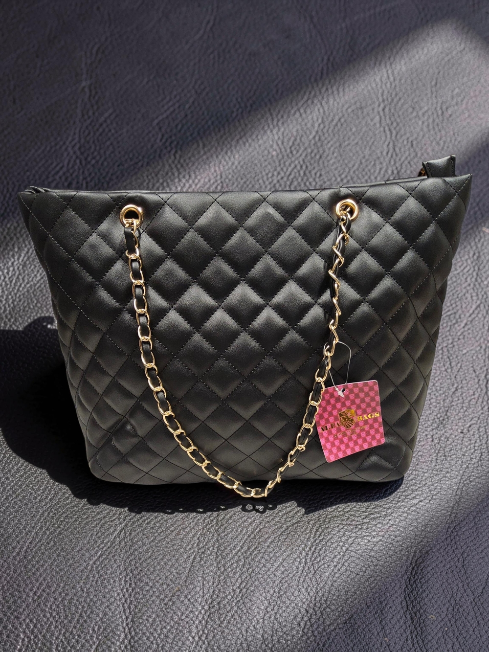 NWOT Black Quilted Shoulder Bag with Gold Chain Handles